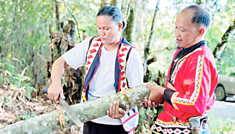 KaBAMBOOhayan Noemie Buclasan (left) is one of many beneficiaries who took advantage of free training in bamboo propagation, processing and treatment, which helped the community recover from a natural disaster and develop a new livelihood.