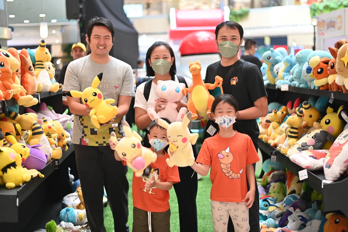 Mallgoers with official ‘Pokémon’ merchandise at SM North EDSA’s The Block Atrium.