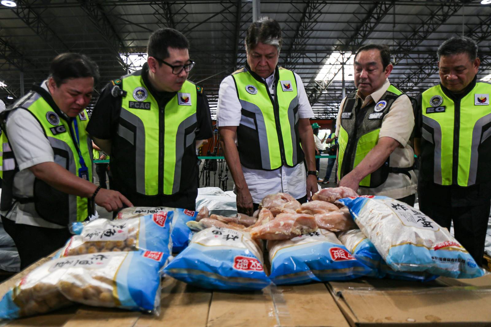 Officials from the Bureau of Customs (BOC), together with Senate Committee on Agriculture, Food, and Agrarian Reform Chairperson Senator Francis Pangilinan, inspected a seized shipment of misdeclared frozen chicken breasts and fish balls at the Manila International Container Port (MICP) on Monday, 27 October 2025.

The shipment, declared to contain 5,300 cartons of fish balls, was later discovered to hold sacks of frozen chicken breasts valued at ₱12.96 million, highlighting ongoing efforts to curb agricultural smuggling and protect consumers from unsafe and misdeclared imports.