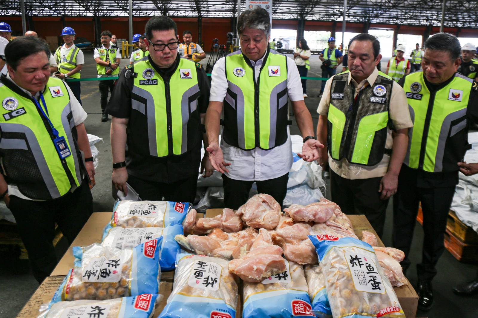 Officials from the Bureau of Customs (BOC), together with Senate Committee on Agriculture, Food, and Agrarian Reform Chairperson Senator Francis Pangilinan, inspected a seized shipment of misdeclared frozen chicken breasts and fish balls at the Manila International Container Port (MICP) on Monday, 27 October 2025.

The shipment, declared to contain 5,300 cartons of fish balls, was later discovered to hold sacks of frozen chicken breasts valued at ₱12.96 million, highlighting ongoing efforts to curb agricultural smuggling and protect consumers from unsafe and misdeclared imports.