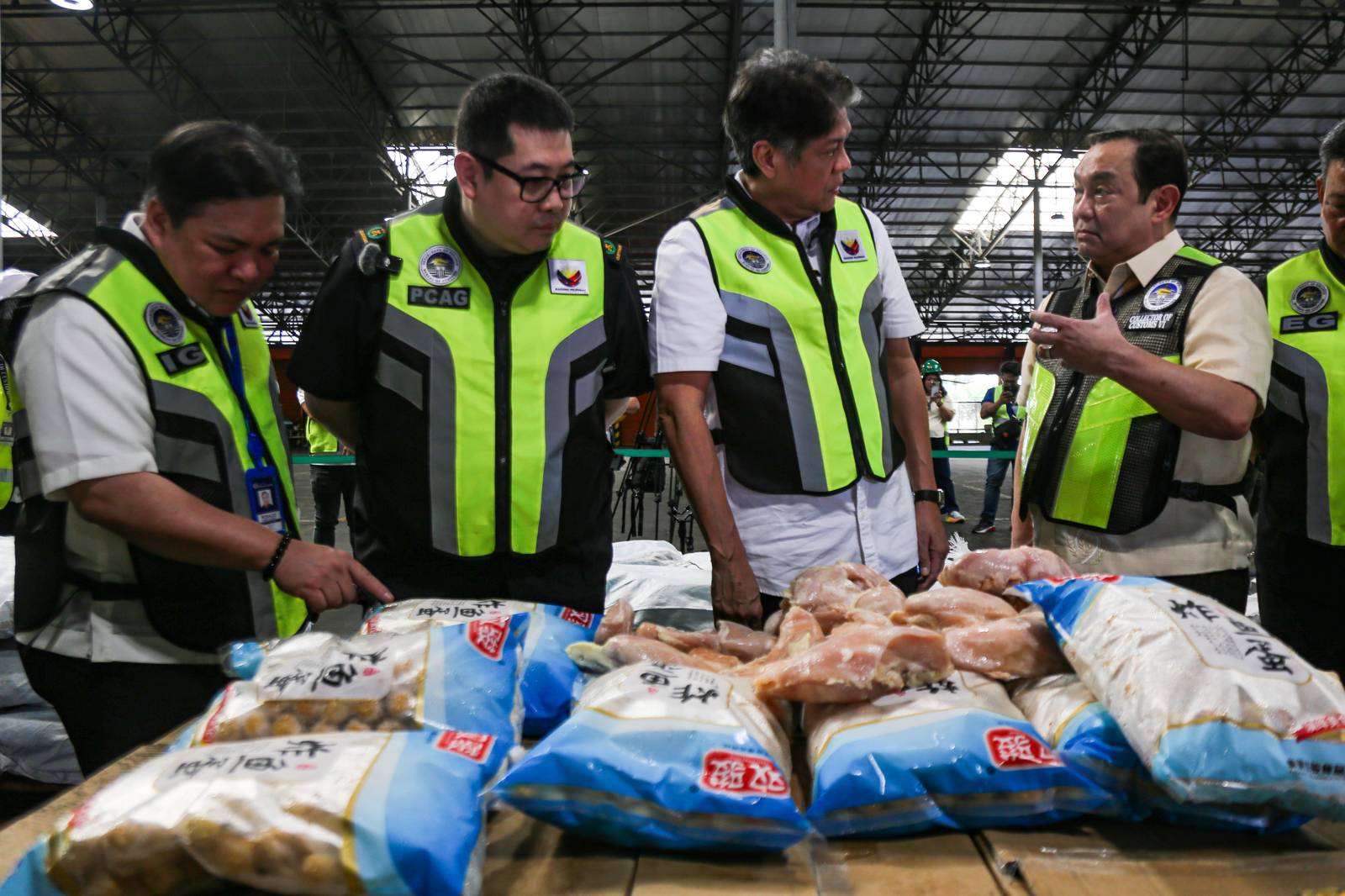 Officials from the Bureau of Customs (BOC), together with Senate Committee on Agriculture, Food, and Agrarian Reform Chairperson Senator Francis Pangilinan, inspected a seized shipment of misdeclared frozen chicken breasts and fish balls at the Manila International Container Port (MICP) on Monday, 27 October 2025.

The shipment, declared to contain 5,300 cartons of fish balls, was later discovered to hold sacks of frozen chicken breasts valued at ₱12.96 million, highlighting ongoing efforts to curb agricultural smuggling and protect consumers from unsafe and misdeclared imports.
