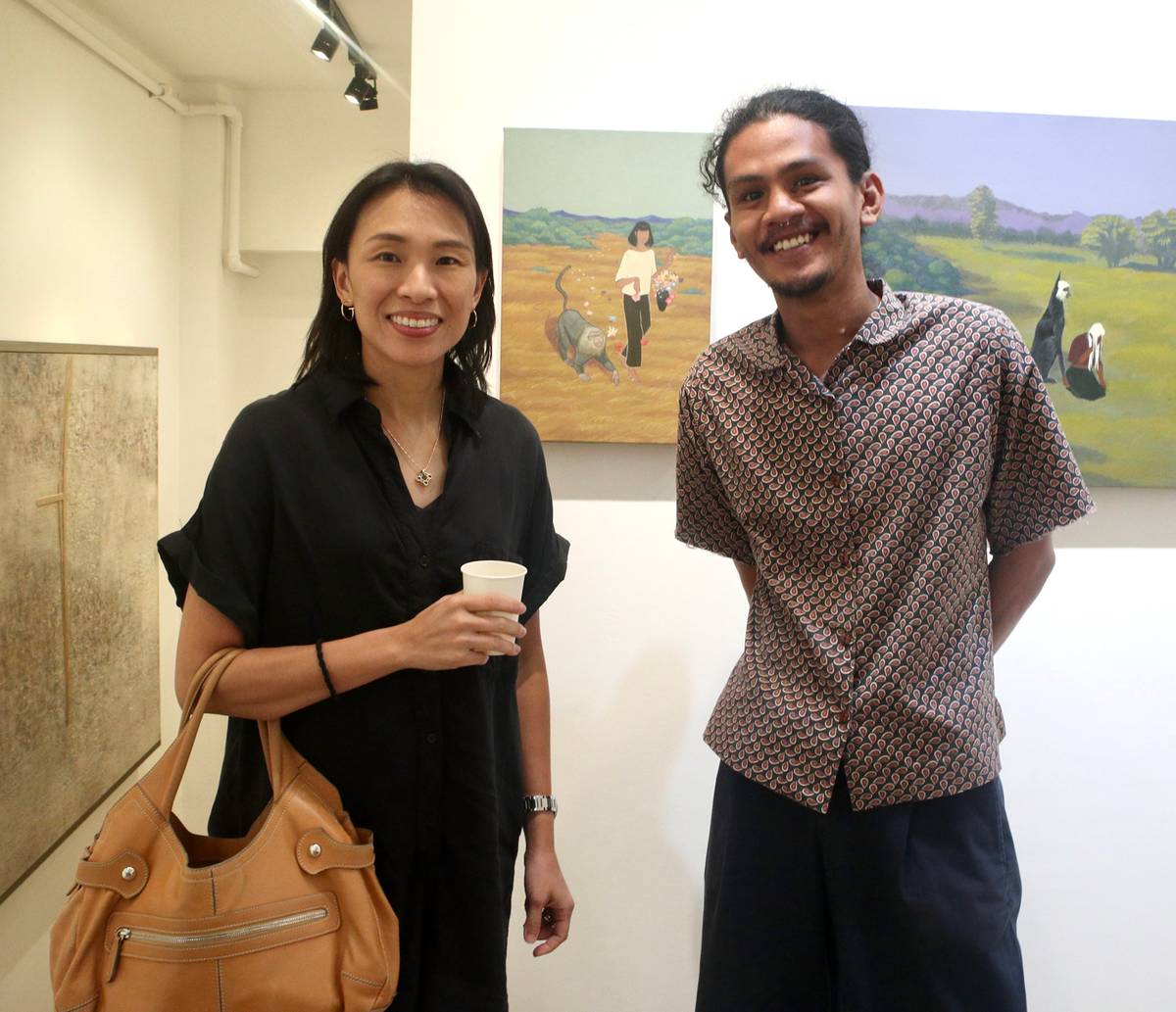 Kaye Sala and artist Enric Carl Callangan.