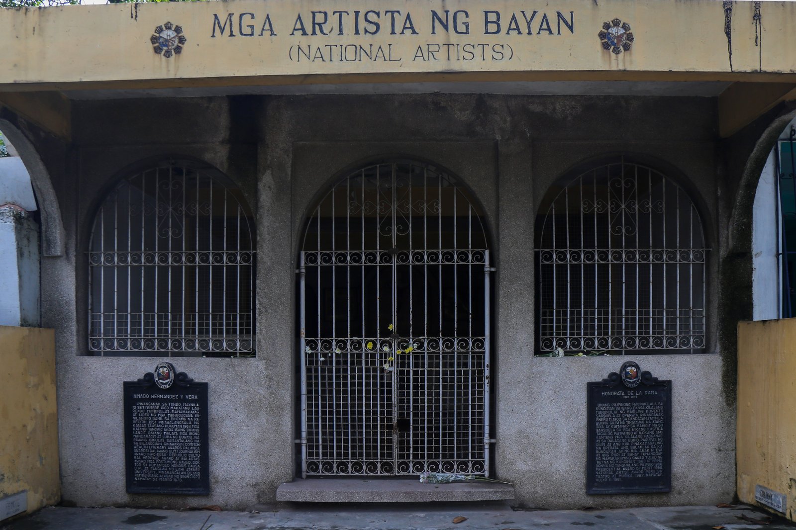 A curious visitor drops by the mausoleum of National Artists Amado Vera Hernandez and Honorata dela Rama at the Manila North Cemetery on 28 October 2025. Ka Amado, a labor leader and writer, was posthumously honored as National Artist for Literature in 1973, while his wife, Honorata, also known as Ka Atang, was proclaimed National Artist for Theatre and Music on 08 May 1987.