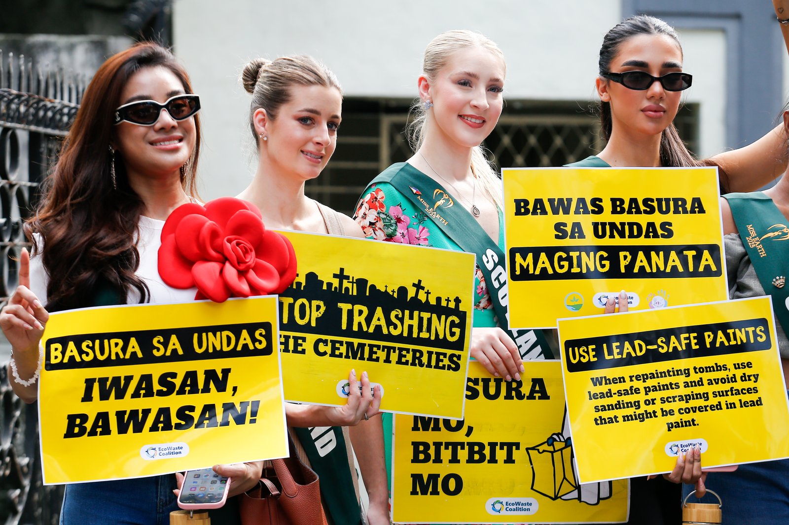Miss Earth representatives gather at the Manila North Cemetery in Manila on Wednesday, 29 October 2025. Together with Ecowaste Coalition, Metro Manila Development Authority (MMDA), Department of Public Services (DPS) Manila, and other environmental advocates, the group urges the public to reduce waste and plastic pollution in celebrating All Saints' Day.