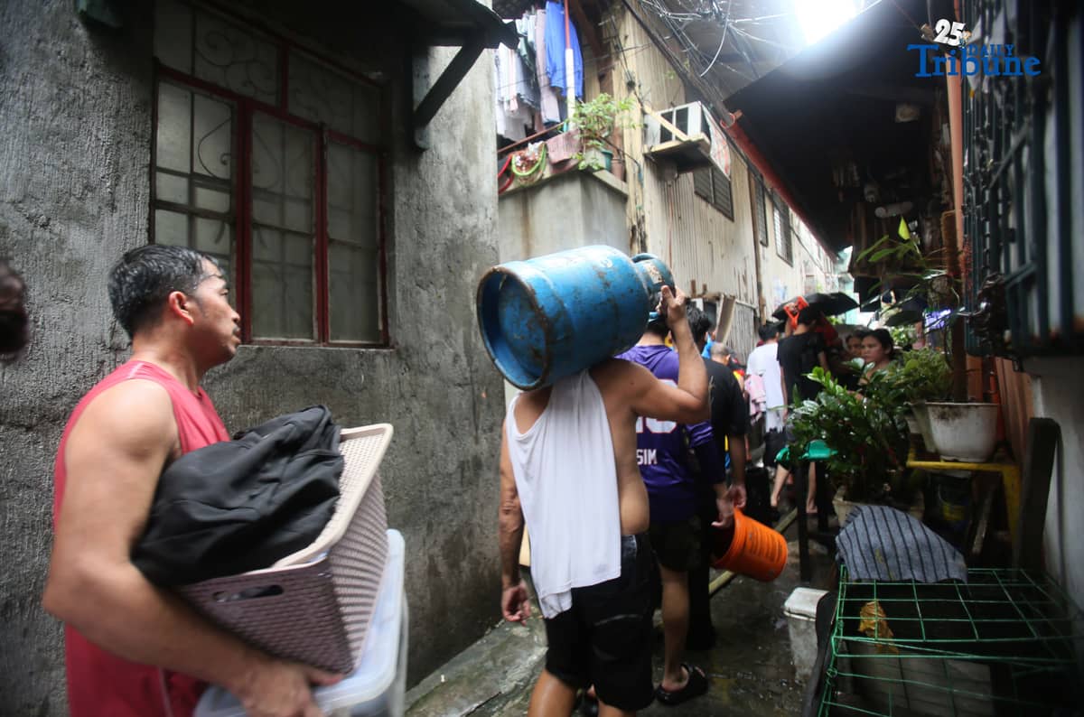 (October 30 2025) Fire-fighters responded to the 3rd alarm fire that hit at Brgy. San Antonio in Quezon City on Thursday October 30 2025. Photo/Analy Labor