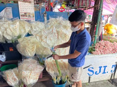 Dangwa sellers adapt as online competition grows