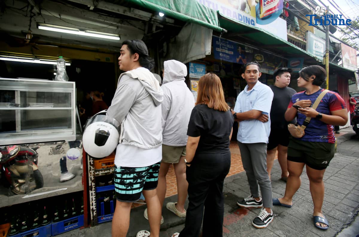 (October 31 2025) Customers queuing at Morning Sun Eatery in Quezon City on Friday October 31 2025 to buy barbecue. The Morning Sun Eatery offers Ilocano dishes and barbecue, earning a place in the first Michelin Guide Philippines 2026, announced on Oct. 30. The modest karinderya received the Bib Gourmand recognition, awarded to restaurants that serve exceptional food at reasonable prices, they are now among the 25 Bib Gourmand dining destinations in the Philippines. Photo/Analy Labor
