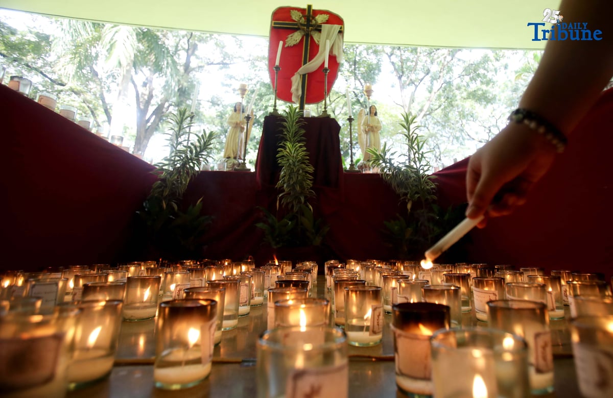 (November 01 2025) On All Saints Day Celebration Families offer prayers and light candles to their departed loved ones at the Parish of the Holy Sacrifice in University of the Philippines, Quezon City, on November 1 2025. Photo/Analy Labor