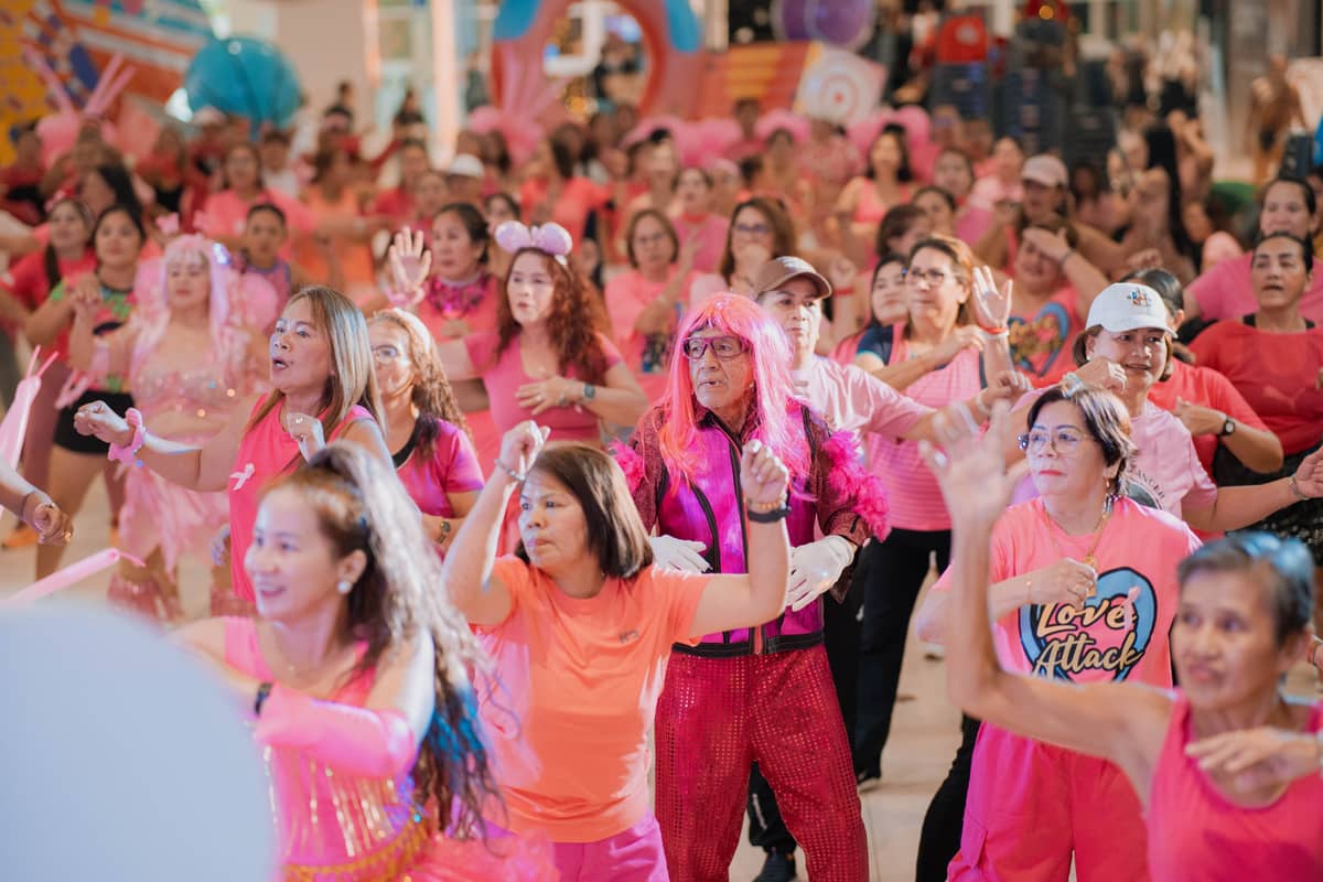 In a joyful wave of pink, participants dance with purpose at SM City Davao’s Zumba session — celebrating strength, unity, and the fight against breast cancer.