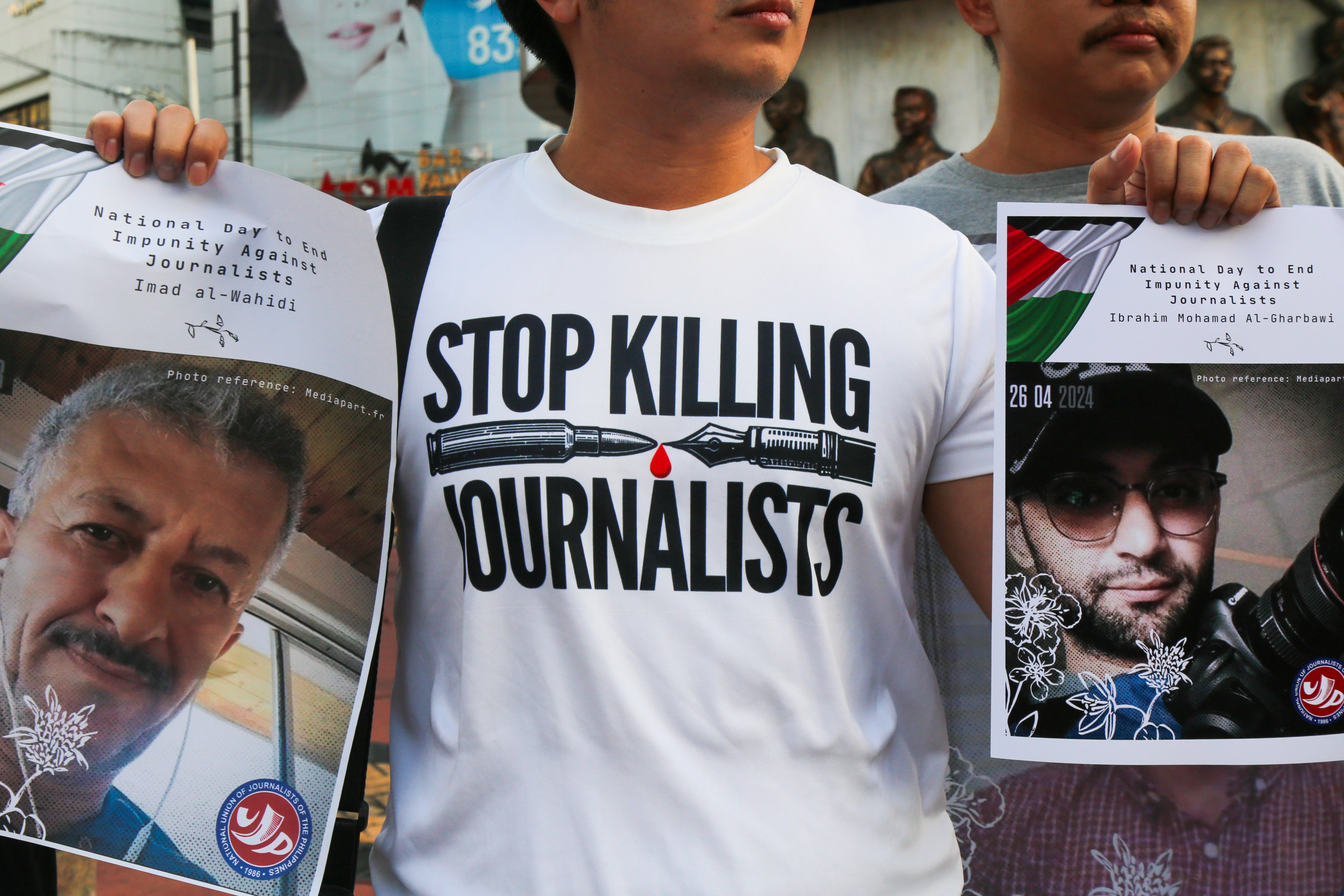 Media workers commemorate the International Day to End Impunity for Crimes Against Journalists 