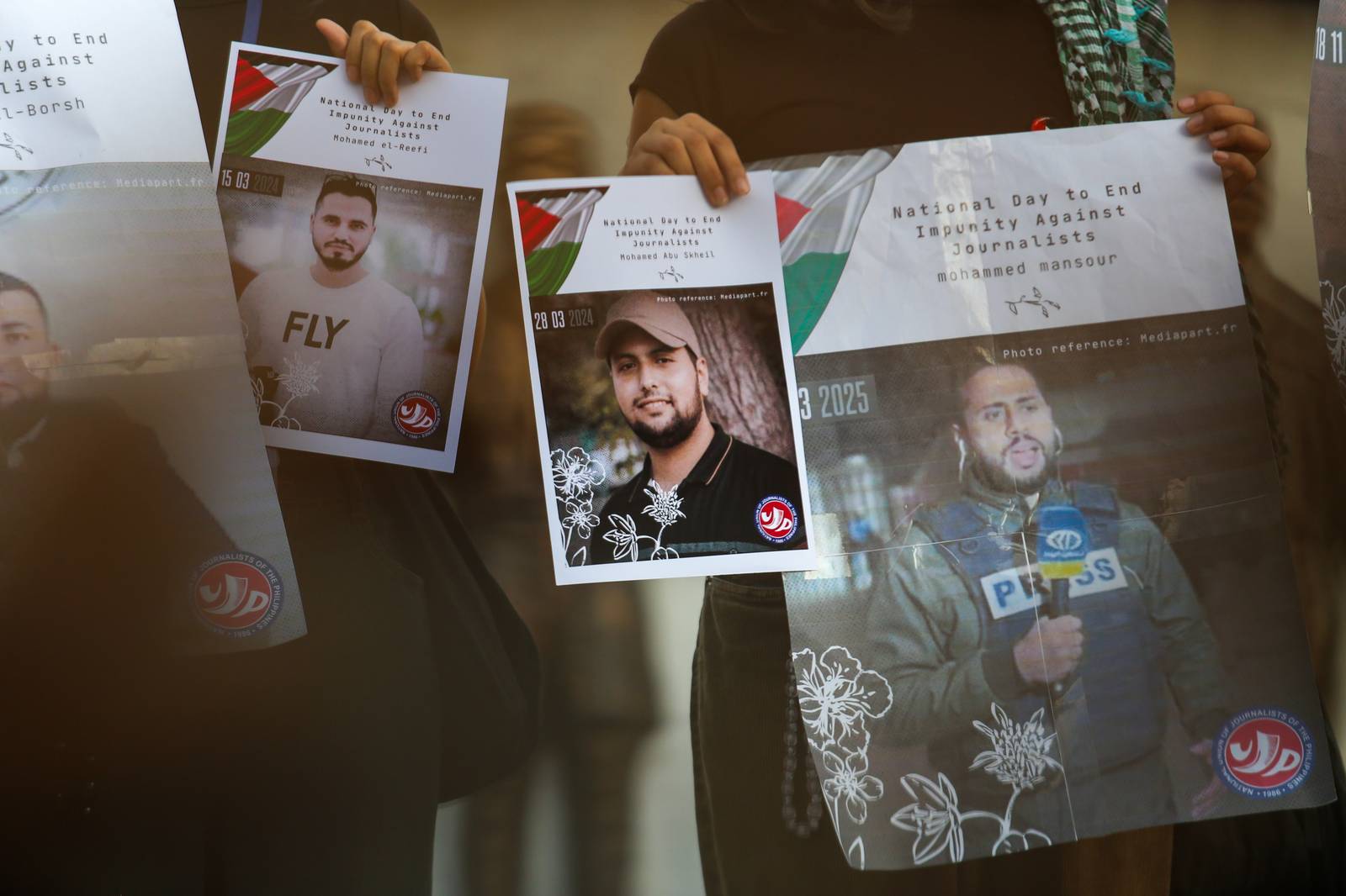 Journalists, students, human rights defenders, and press freedom advocates gather at the Boy Scouts Circle on Tomas Morato Avenue in Quezon City on the International Day to End Impunity for Crimes Against Journalists, 02 November 2025, as they commemorate the fallen journalists in Palestine and the Philippines who were killed while doing their duty.