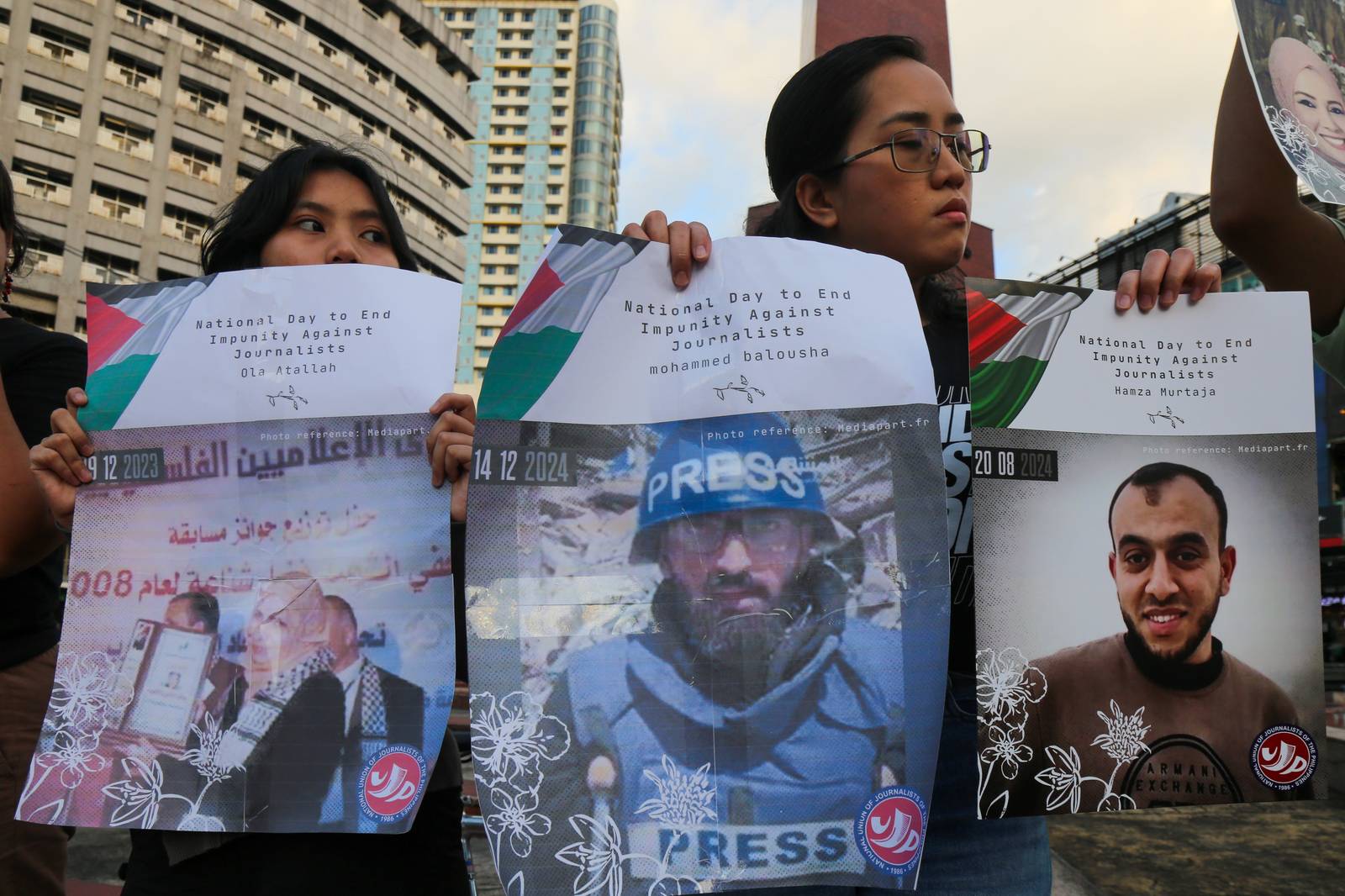 Journalists, students, human rights defenders, and press freedom advocates gather at the Boy Scouts Circle on Tomas Morato Avenue in Quezon City on the International Day to End Impunity for Crimes Against Journalists, 02 November 2025, as they commemorate the fallen journalists in Palestine and the Philippines who were killed while doing their duty.