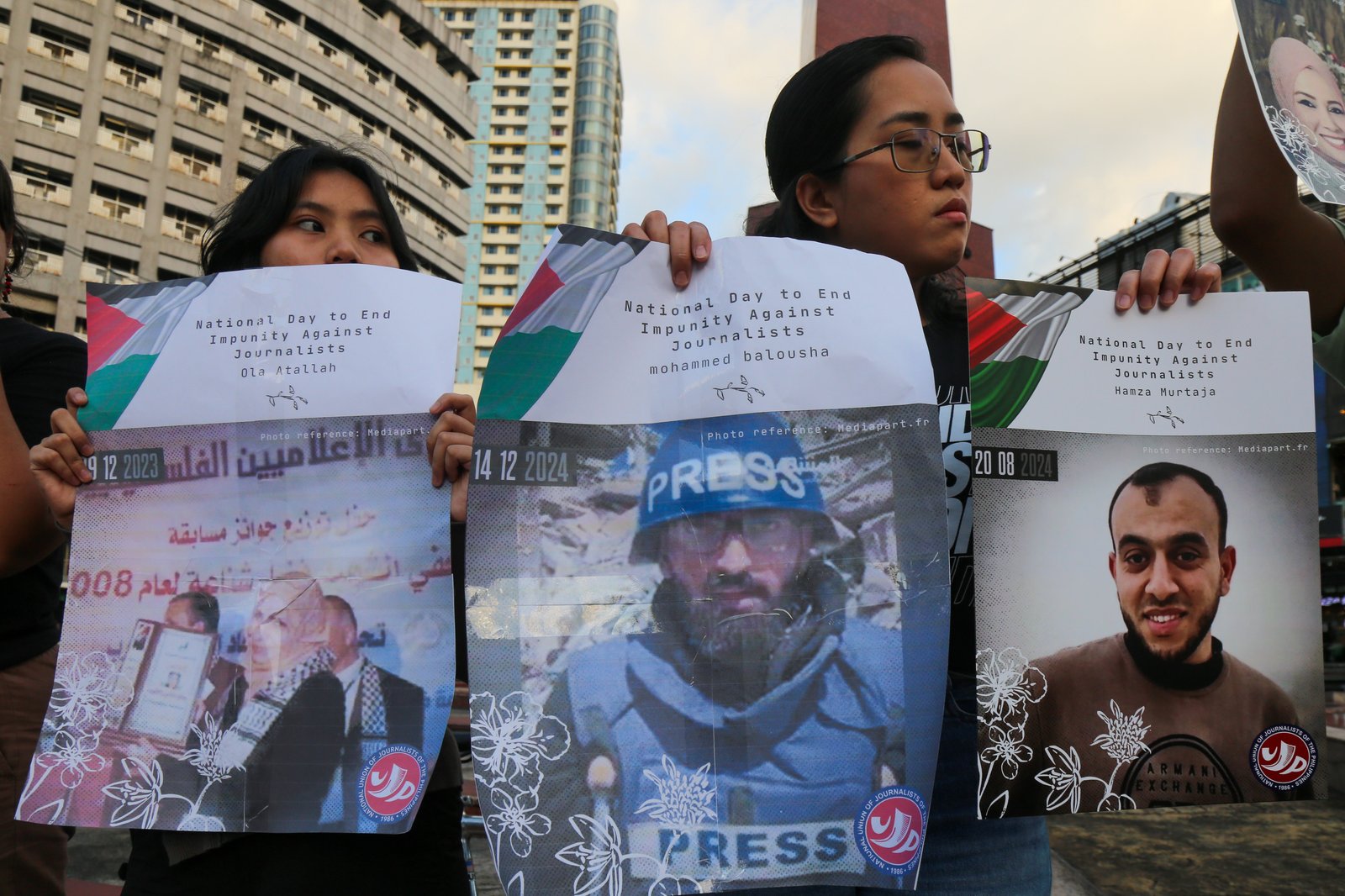 Journalists, students, human rights defenders, and press freedom advocates gather at the Boy Scouts Circle on Tomas Morato Avenue in Quezon City on the International Day to End Impunity for Crimes Against Journalists, 02 November 2025, as they commemorate the fallen journalists in Palestine and the Philippines who were killed while doing their duty.