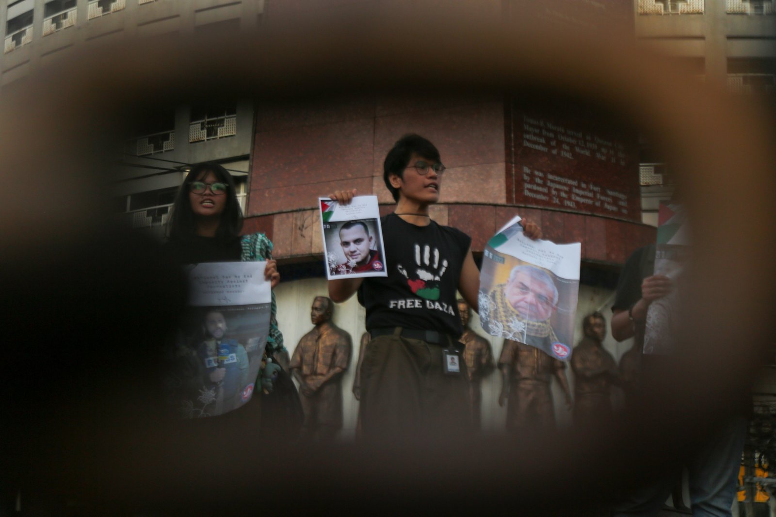 Journalists, students, human rights defenders, and press freedom advocates gather at the Boy Scouts Circle on Tomas Morato Avenue in Quezon City on the International Day to End Impunity for Crimes Against Journalists, 02 November 2025, as they commemorate the fallen journalists in Palestine and the Philippines who were killed while doing their duty.