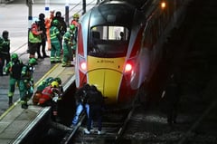 Two British men held for train stabbing