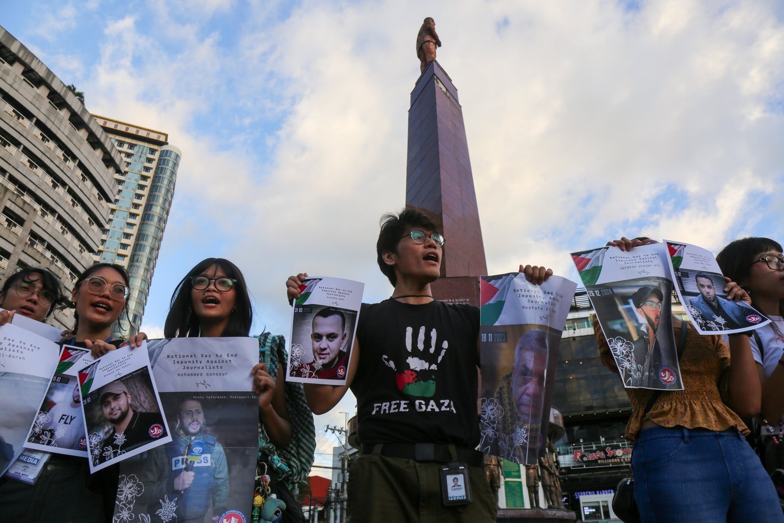 Journalists, students, human rights defenders, and press freedom advocates gather at the Boy Scouts Circle on Tomas Morato Avenue in Quezon City on the International Day to End Impunity for Crimes Against Journalists, 02 November 2025, as they commemorate the fallen journalists in Palestine and the Philippines who were killed while doing their duty.