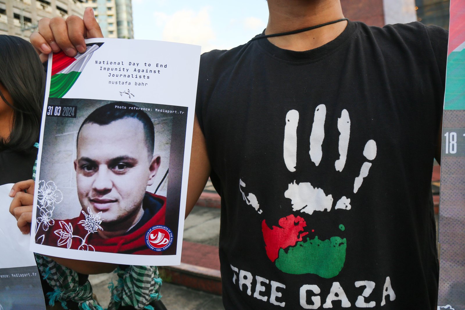 Journalists, students, human rights defenders, and press freedom advocates gather at the Boy Scouts Circle on Tomas Morato Avenue in Quezon City on the International Day to End Impunity for Crimes Against Journalists, 02 November 2025, as they commemorate the fallen journalists in Palestine and the Philippines who were killed while doing their duty.