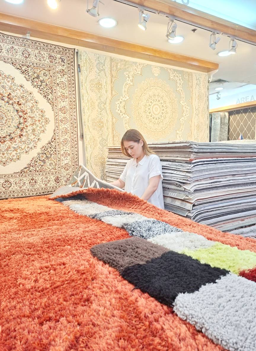 The expert selects area rugs.