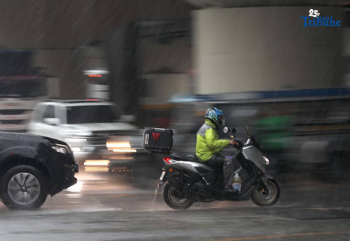 Commuters are braving the downpour with umbrellas and raincoats along EDSA in Quezon City. PAGASA says a shear line is affecting parts of Northern and Central Luzon.