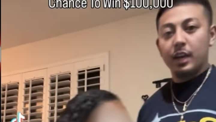 Screencap of a content creator making his sister participate in the "Emily Blind Prank" on TIkTok.