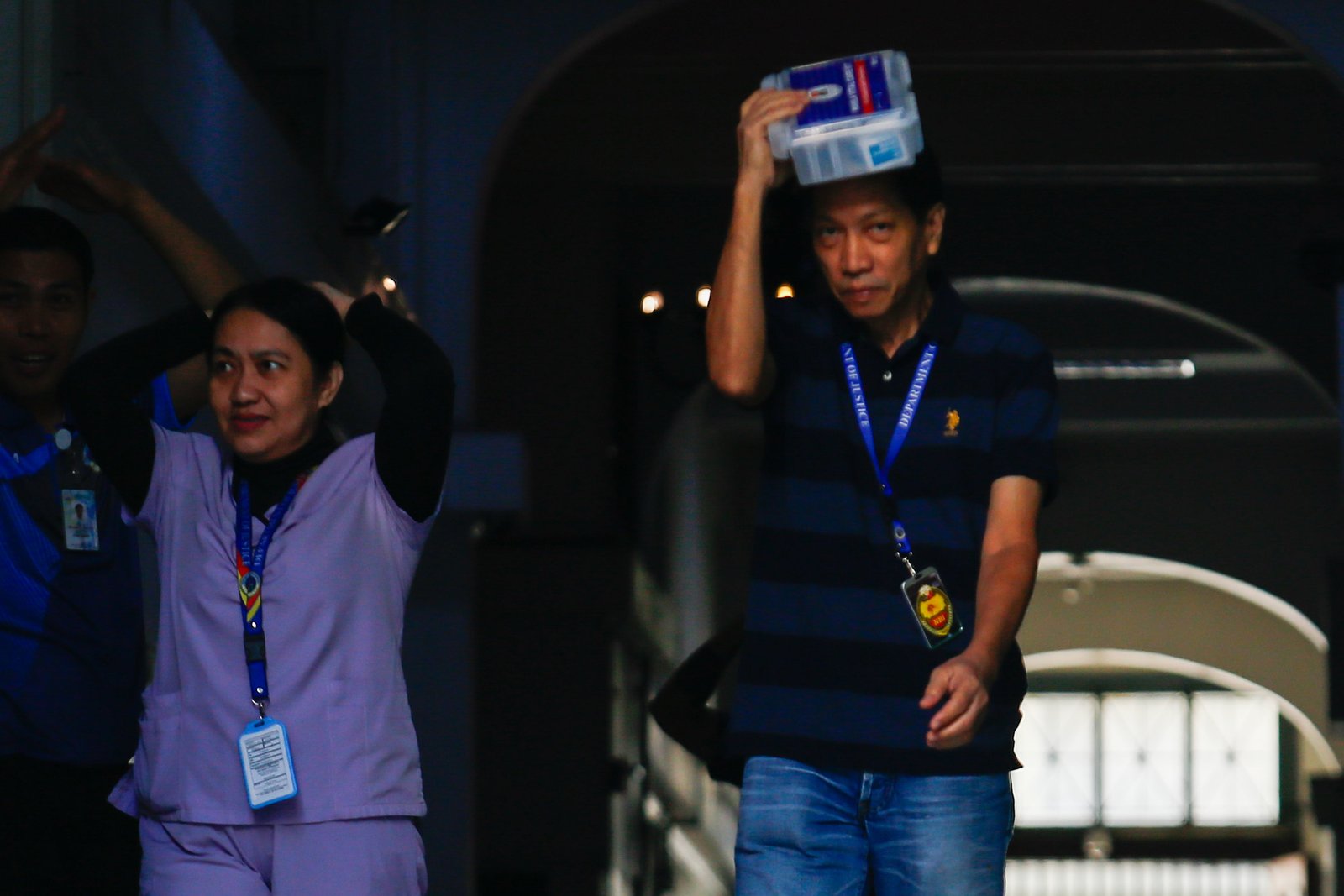 Department of Justice personnel evacuate to the open parking area during the Nationwide Simultaneous Earthquake Drill (NSED) at Padre Faura, Manila, on Thursday morning, 06 November 2025. The drill aims to raise public awareness and strengthen preparedness for potential earthquakes.
