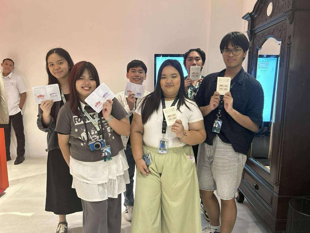 Visitors get their passports stamped.