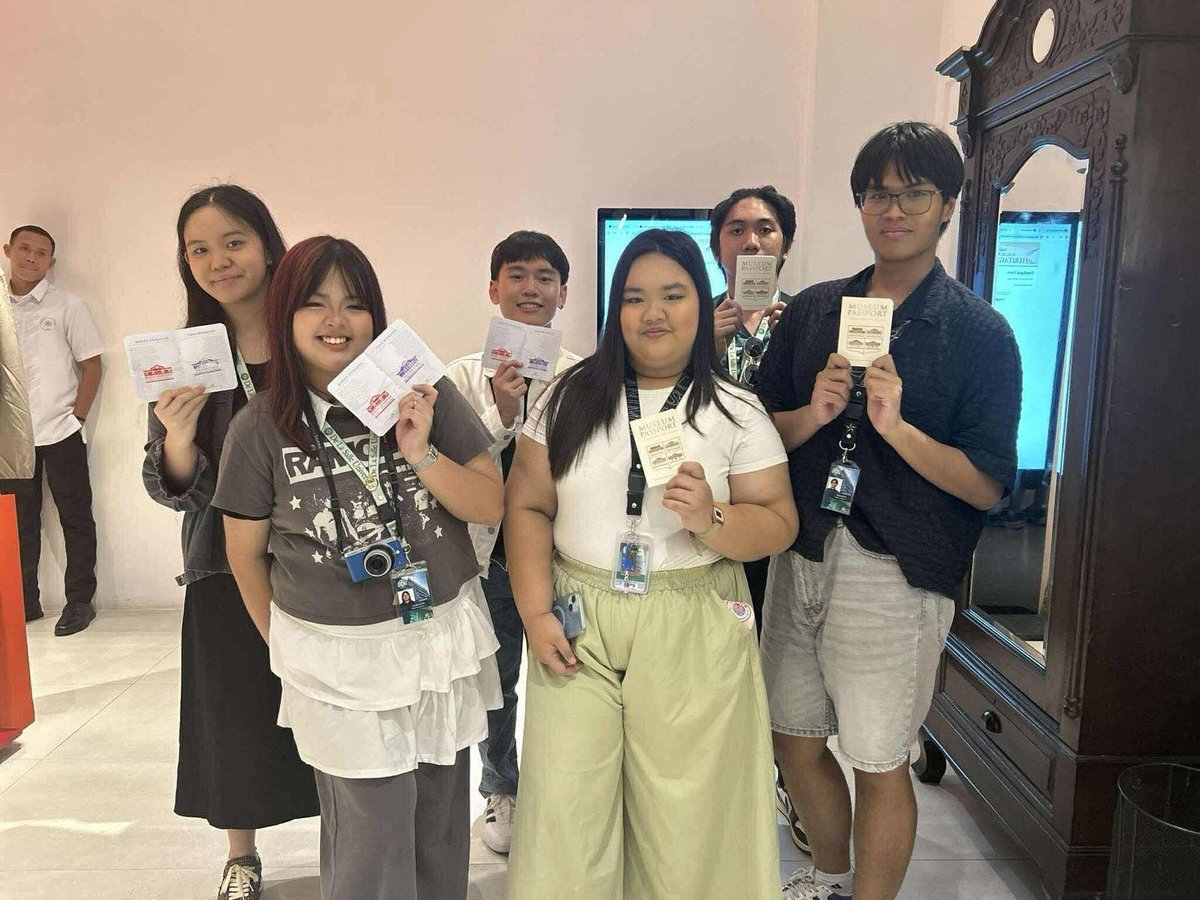 Visitors get their passports stamped.