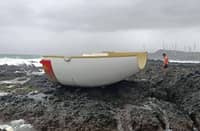 THE Philippine Coast Guard recovers rocket debris with Chinese markings along the shore of Barangay Saoit, Burgos, on Sunday.