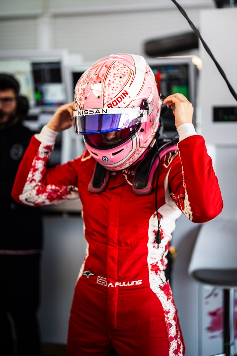 READY for action, Pulling adjusts her helmet before taking to the track.