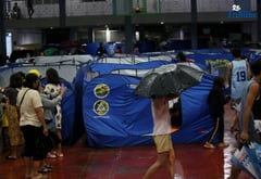 Philippines digs out from Typhoon Fung-wong as death toll climbs