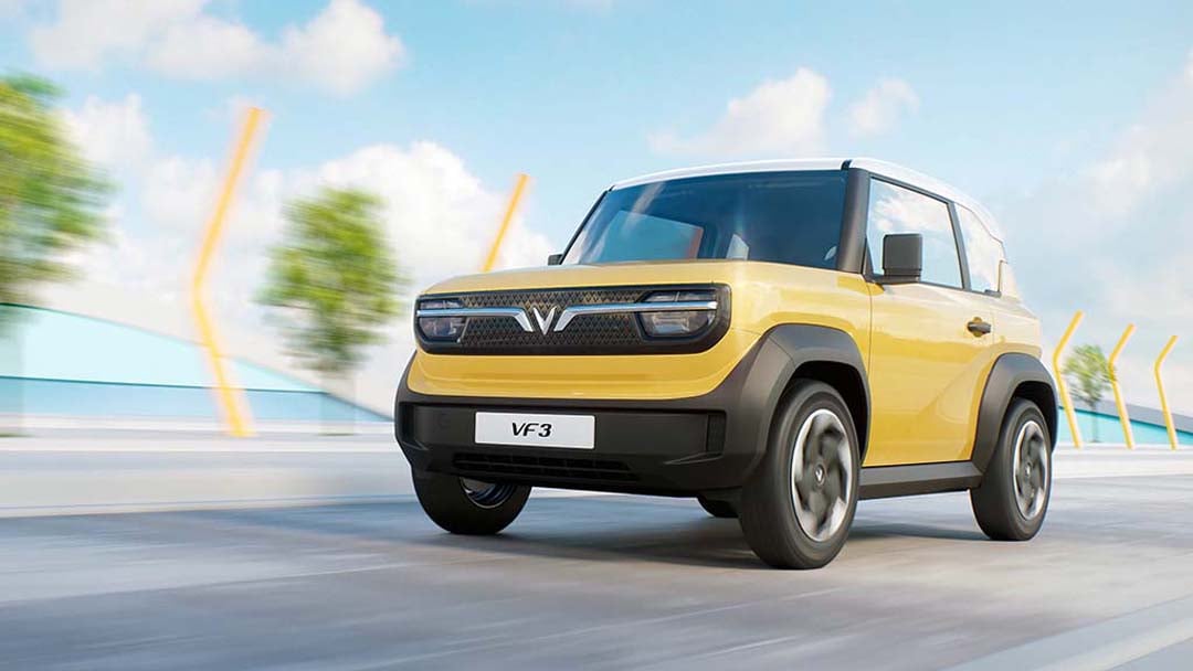 YELLOW body of the VinFast VF 3 shows a compact electric design made for city driving.