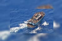 One dead, 10 rescued as boat with 90 migrants sinks