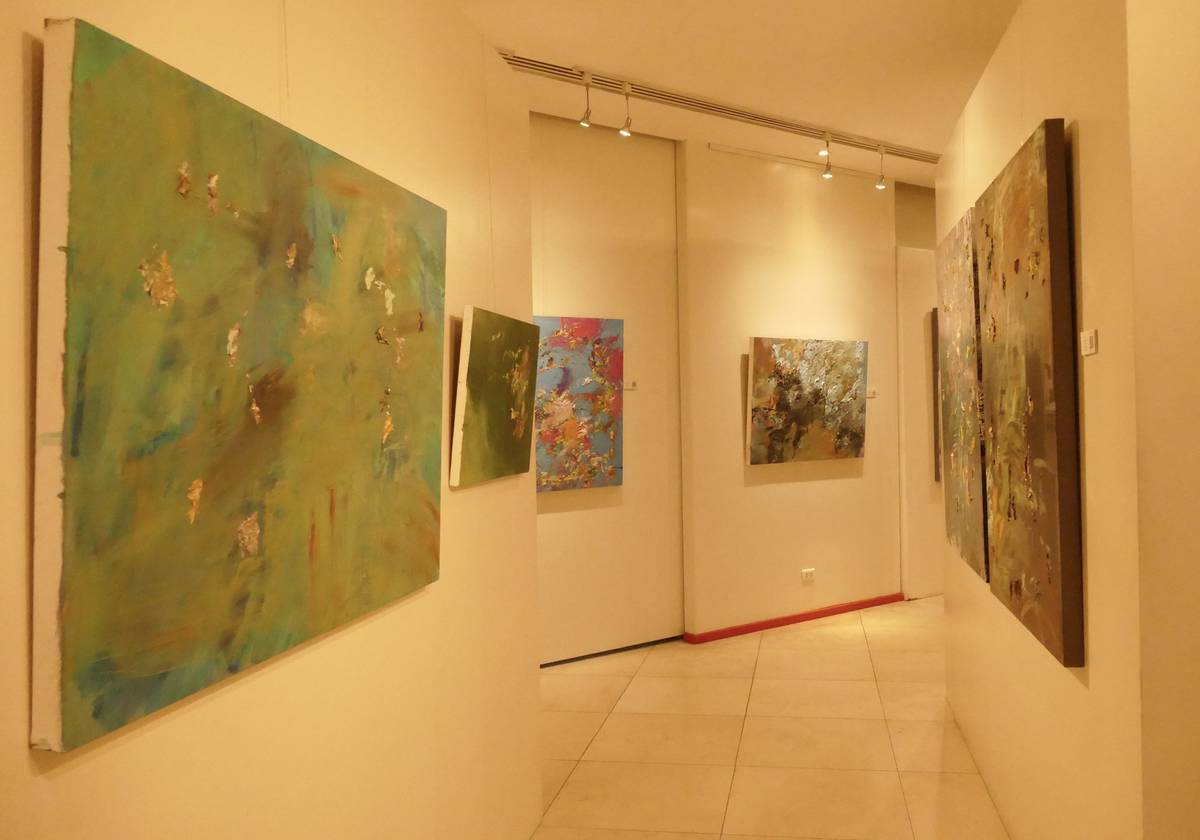 Jonathan Olazo's artworks at the 'Light Receptacle Café' exhibit.