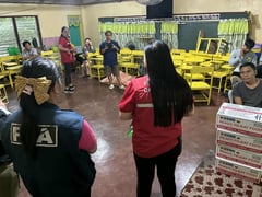 PPA, DSWD distribute food packs to stranded passengers in Lucena