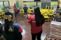 PPA, DSWD distribute food packs to stranded passengers in Lucena