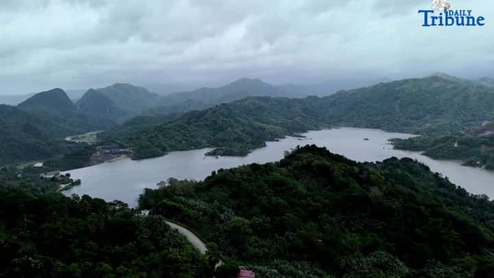 STORM SHIELD. Dark clouds loom over the Sierra Madre mountain range as seen from the Casili River in Barangay Pintong Bukawe, San Mateo, Rizal on Monday, 10 November 2025. According to PAGASA, the rugged terrain of Luzon — including the Sierra Madre — helped weaken Super Typhoon Uwan (Fung-Wong) as it crossed the country’s landmass.