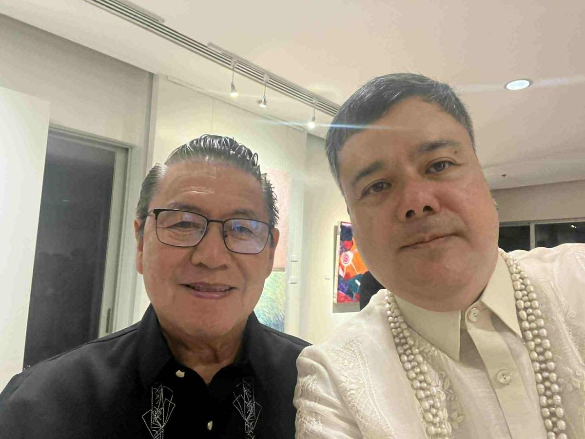 Belleza with art critic Cid Reyes.