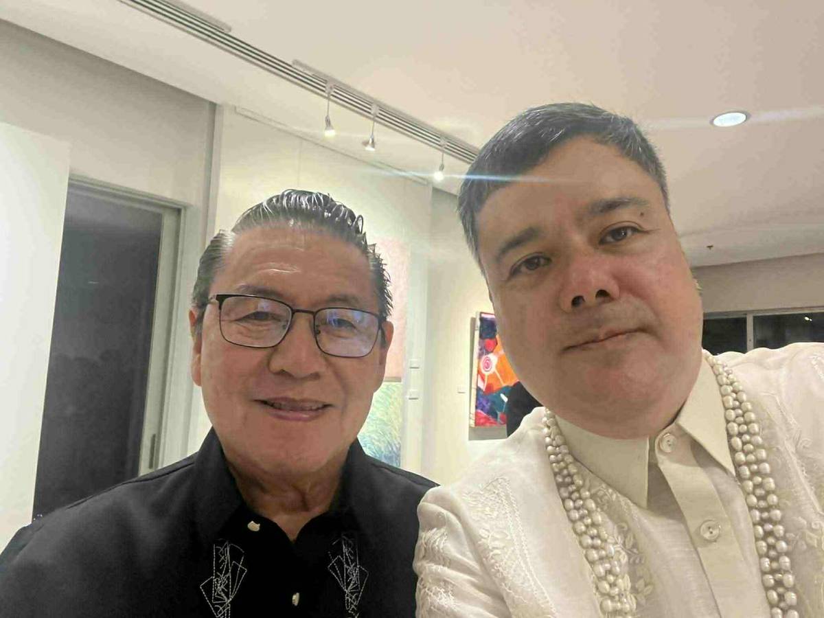 Belleza with art critic Cid Reyes.