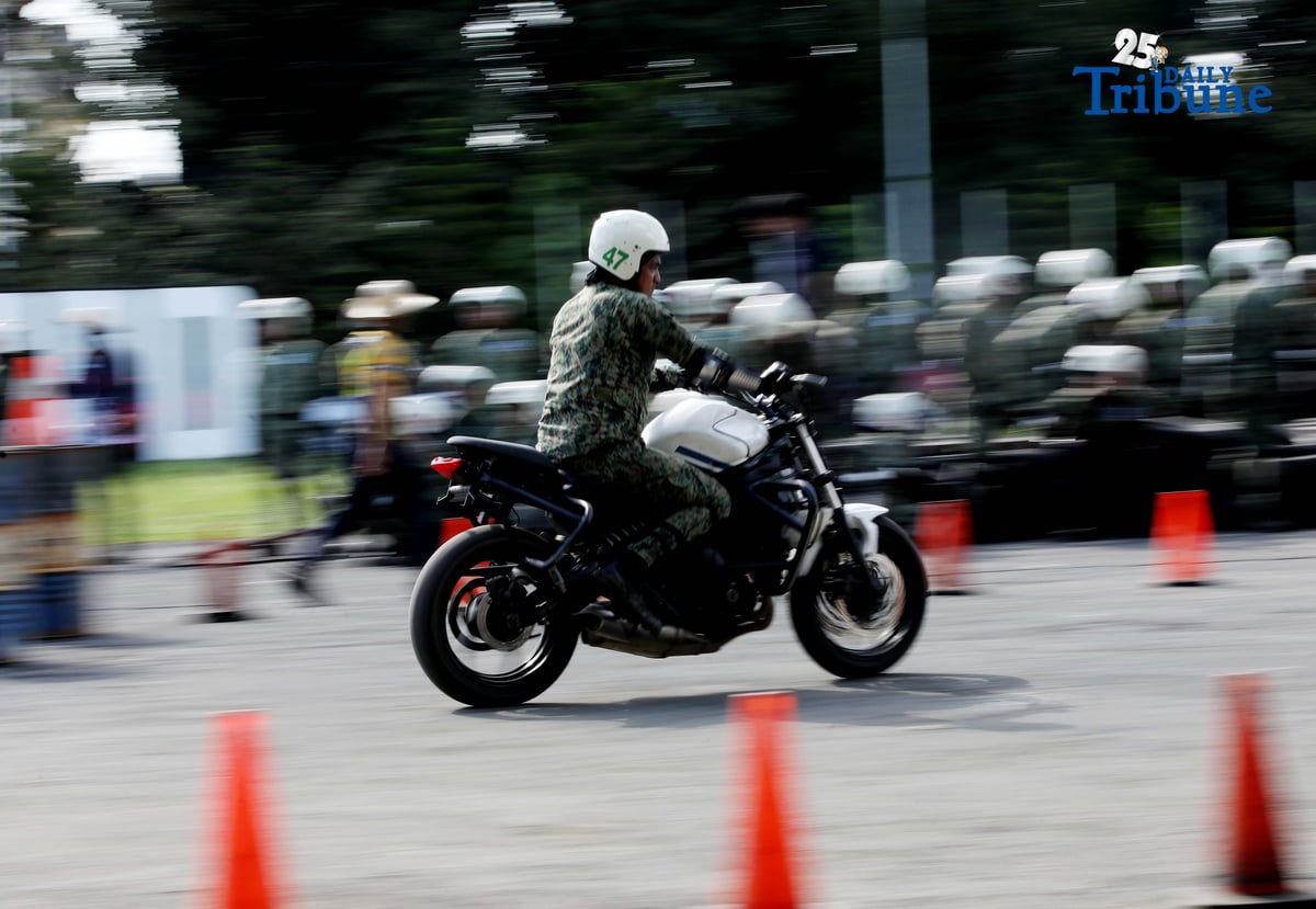 SKILLS ON WHEELS Police personnel undergo intensive motorcycle riding training at Camp Karingal in Quezon City on Tuesday, November 11, 2025, as part of a 45-day course designed to enhance their riding proficiency and operational readiness.