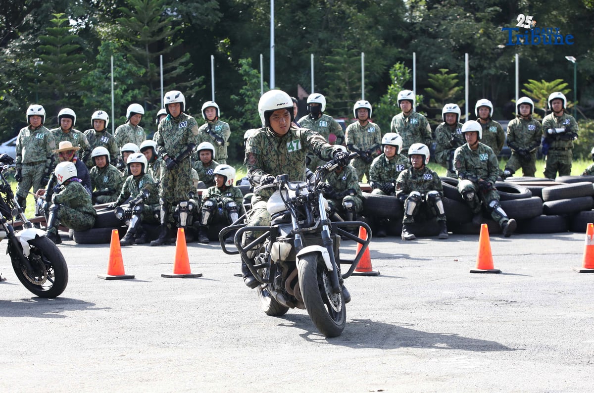 SKILLS ON WHEELS Police personnel undergo intensive motorcycle riding training at Camp Karingal in Quezon City on Tuesday, November 11, 2025, as part of a 45-day course designed to enhance their riding proficiency and operational readiness.