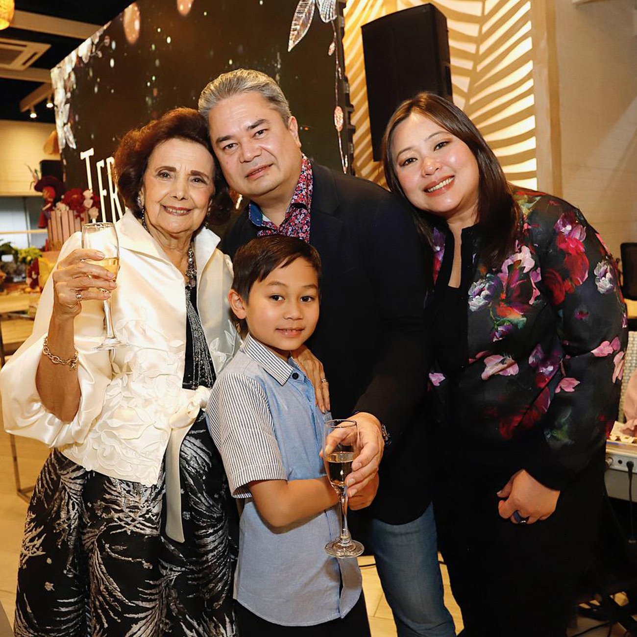 Teresin Mendezona with nephew Sean Campbell, his wife Pia and son Andrew.