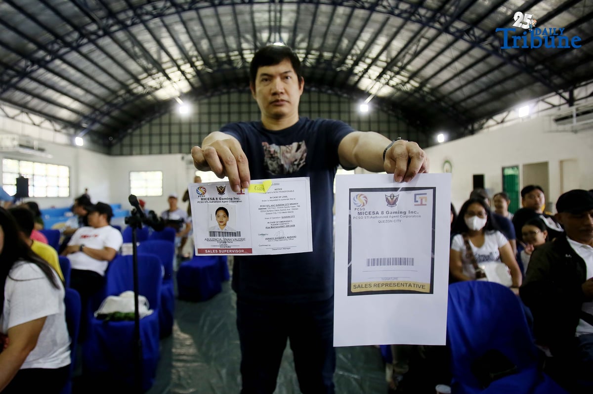 Carlos Montemayor, owner of Micesa 8 Gaming Inc., meets with Small Town Lottery (STL) agents at Camp Karingal in Quezon City, presenting samples of genuine versus fake STL identification cards. Montemayor and STL officials urged closer coordination with local authorities and the police to curb illegal number games such as “jueteng,” and reaffirmed full compliance with PCSO rules to safeguard bettors and STL players.