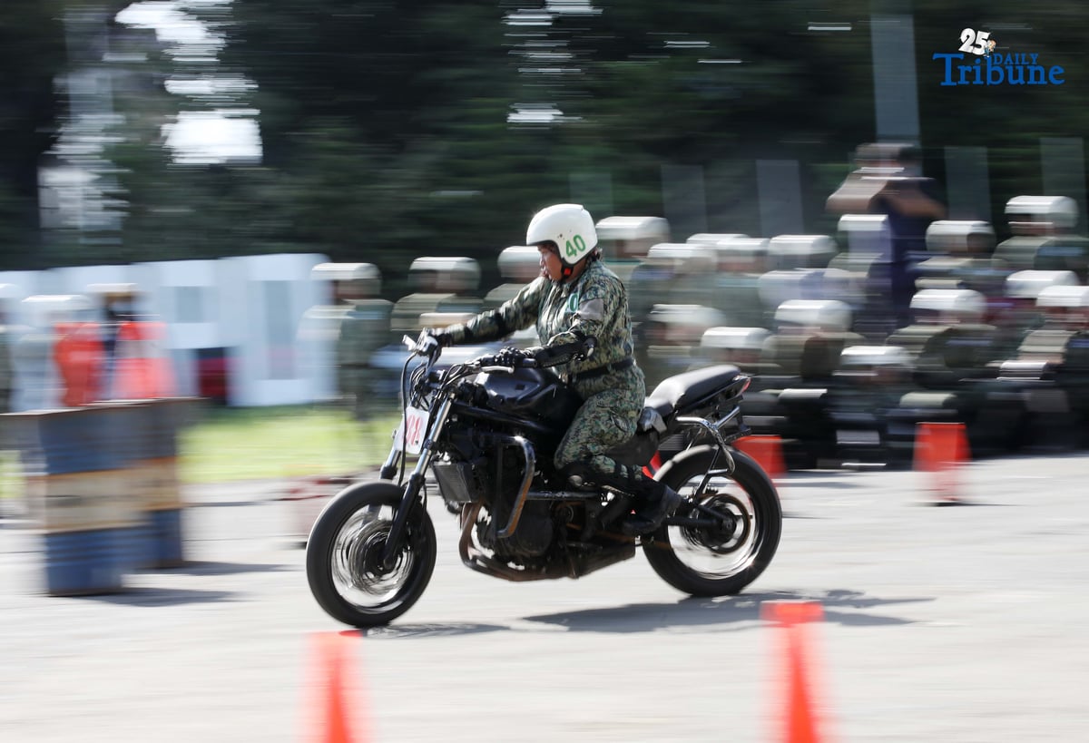 SKILLS ON WHEELS Police personnel undergo intensive motorcycle riding training at Camp Karingal in Quezon City on Tuesday, November 11, 2025, as part of a 45-day course designed to enhance their riding proficiency and operational readiness.