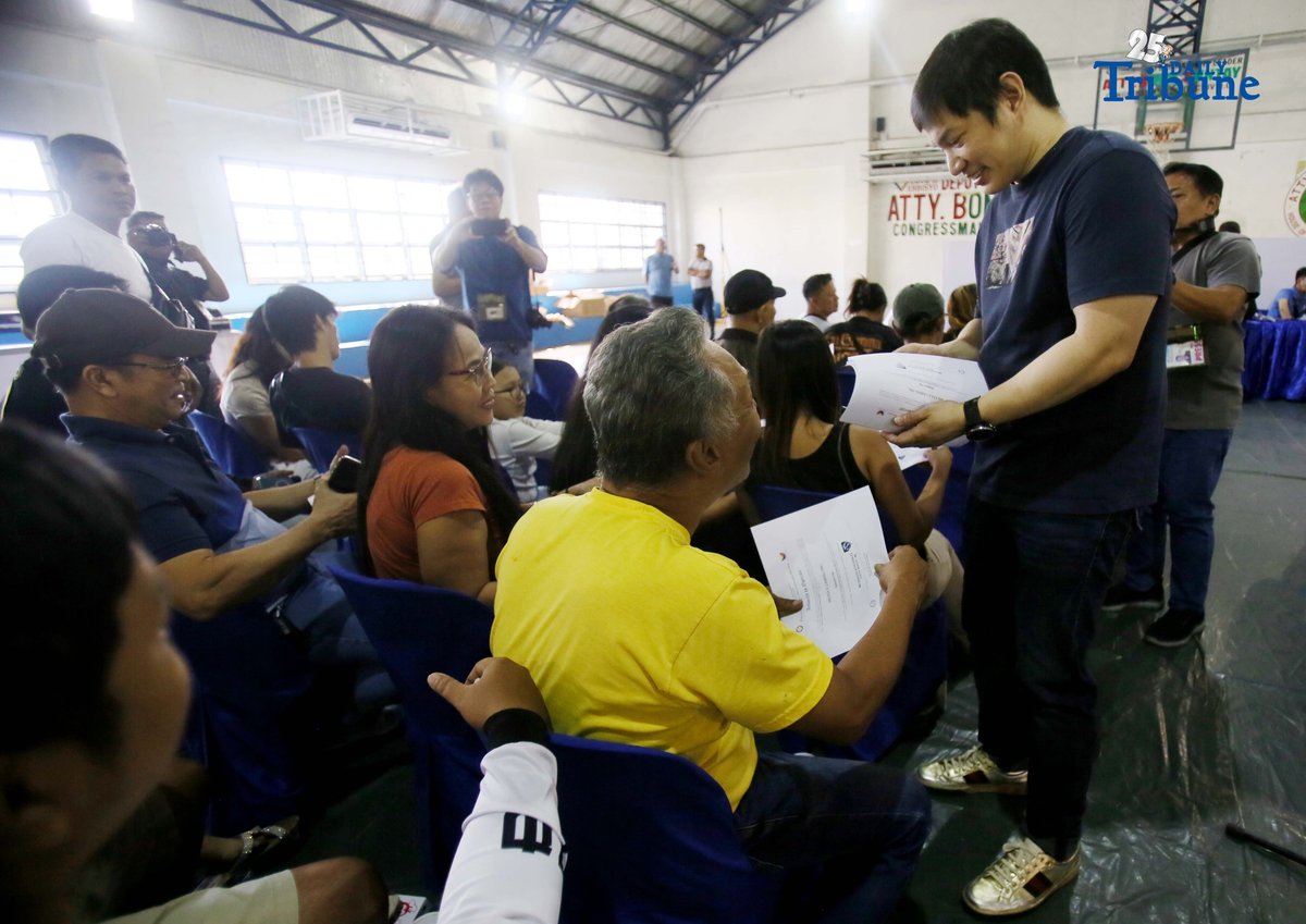 Carlos Montemayor, owner of Micesa 8 Gaming Inc., meets with Small Town Lottery (STL) agents at Camp Karingal in Quezon City, presenting samples of genuine versus fake STL identification cards. Montemayor and STL officials urged closer coordination with local authorities and the police to curb illegal number games such as “jueteng,” and reaffirmed full compliance with PCSO rules to safeguard bettors and STL players.