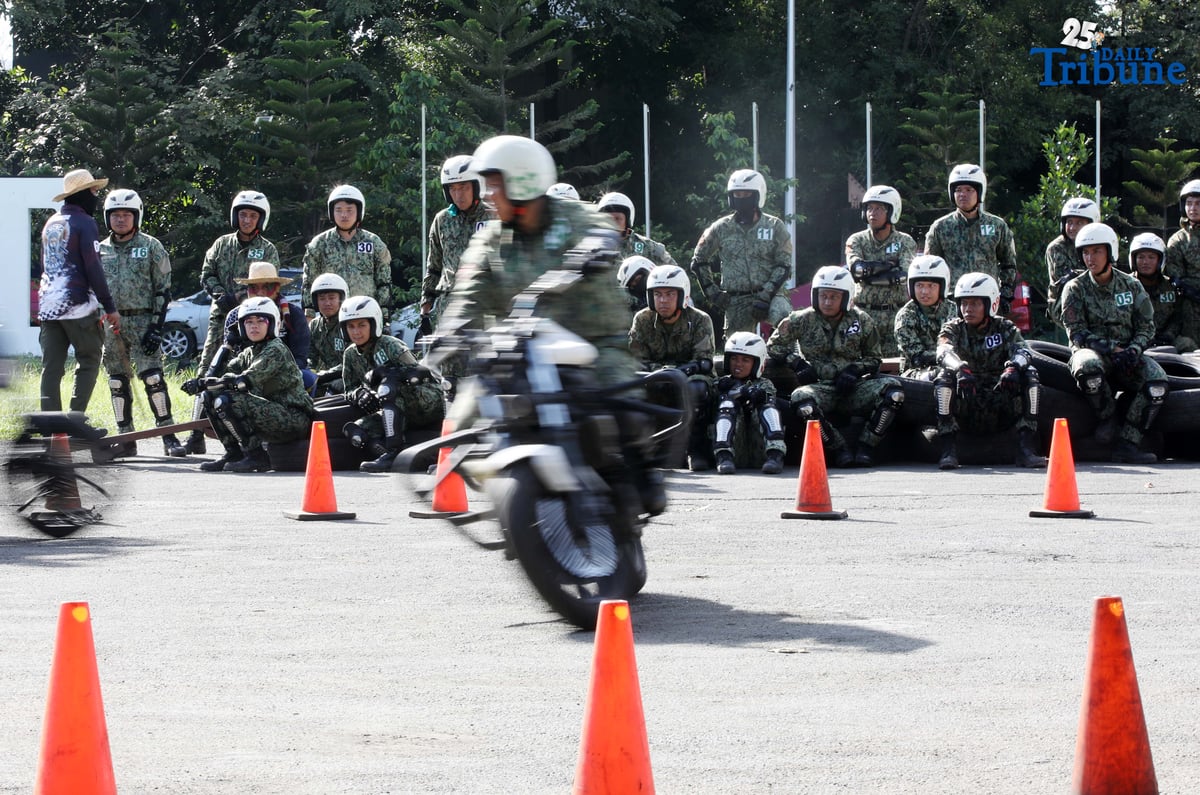 SKILLS ON WHEELS Police personnel undergo intensive motorcycle riding training at Camp Karingal in Quezon City on Tuesday, November 11, 2025, as part of a 45-day course designed to enhance their riding proficiency and operational readiness.