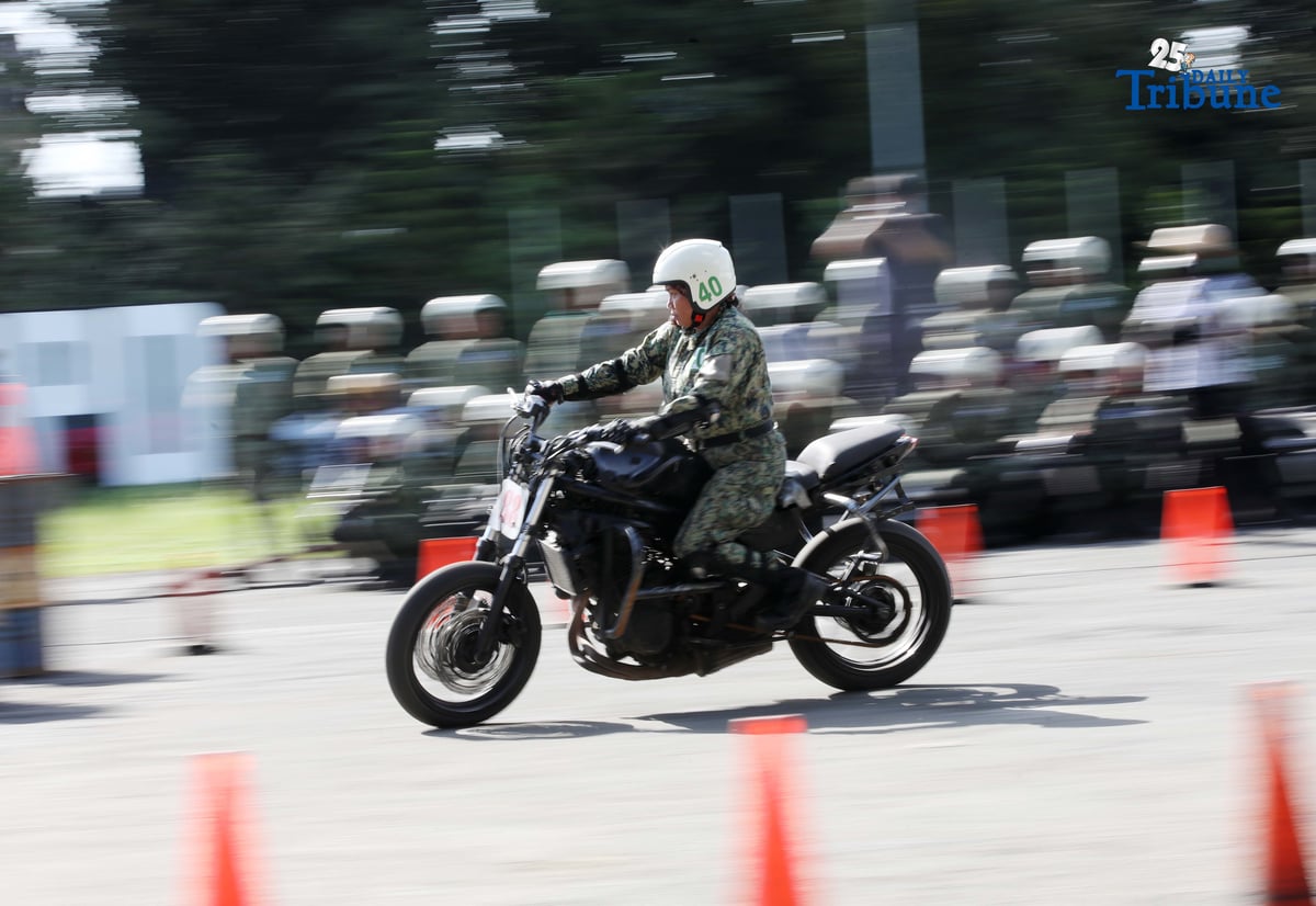 SKILLS ON WHEELS Police personnel undergo intensive motorcycle riding training at Camp Karingal in Quezon City on Tuesday, November 11, 2025, as part of a 45-day course designed to enhance their riding proficiency and operational readiness.