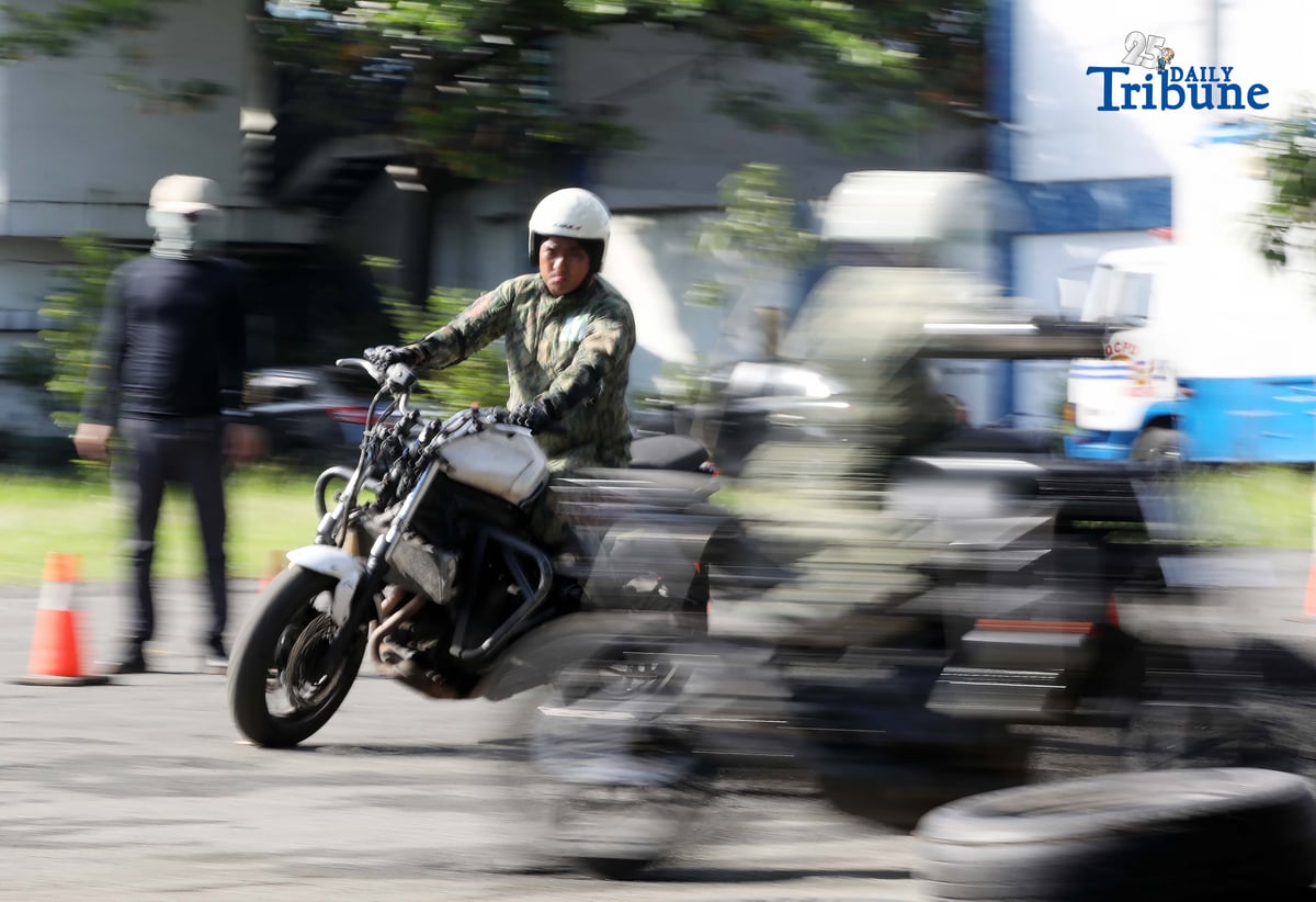 SKILLS ON WHEELS Police personnel undergo intensive motorcycle riding training at Camp Karingal in Quezon City on Tuesday, November 11, 2025, as part of a 45-day course designed to enhance their riding proficiency and operational readiness.