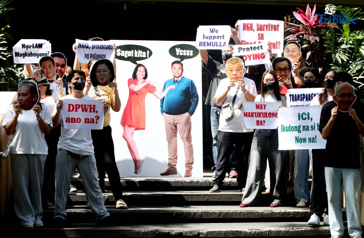 (November 12 2025) Student representatives hold a placards depict good and bad politician link of alleged corruption and protectionism in government projects as they stage a protest at the University of the Philippines Diliman in Quezon City on Wednesday, November 12, 2025, The group praises Ombudsman Boying Remulla, Baguio City Mayor Benjie Magalong, and DPWH Chief Vince Dizon as figures of integrity, while criticizing First Lady Liza Araneta-Marcos, Senator Joel Villanueva and businessman Maynard Ngu—portrayed on the opposite side—for alleged corruption and protectionism in government projects. Photo/Analy Labor
