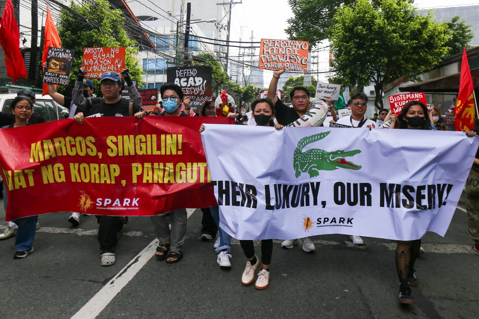Students from Mapua University in Makati gather outside their campus in Pablo Ocampo Sr. Extension on 13 November 2025 as they call for justice and accountability from all officials and contractors involved in corruption.