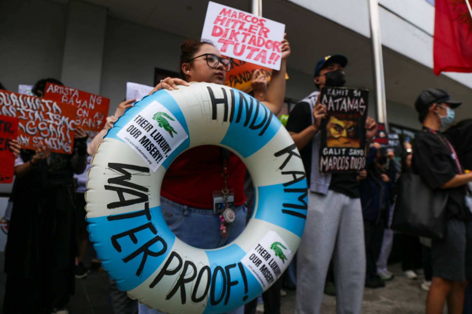 Students from Mapua University in Makati gather outside their campus in Pablo Ocampo Sr. Extension on 13 November 2025 as they call for justice and accountability from all officials and contractors involved in corruption.